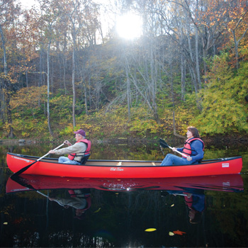 Two people in a canoe on the river